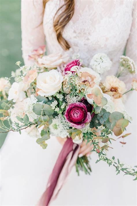 Natural And Loose Garden Style Bridal Bouquet In Muted Dusty Tones Of