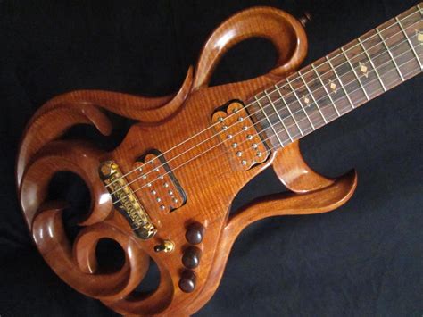 More Of The Beautiful Phoenix Hand Carved Electric Guitar By Rigaud