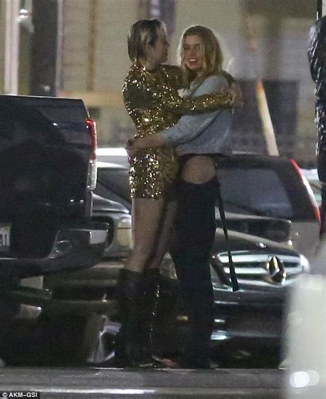 Photos Miley Cyrus Pictured Passionately Kissing A Woman In A Parking