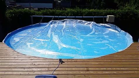 Getting an automatic pool cover reel system may be challenging for many people due to its cost but if you're a handy person, you can design your own diy solar cover reel. DIY powered remote pool reel - YouTube