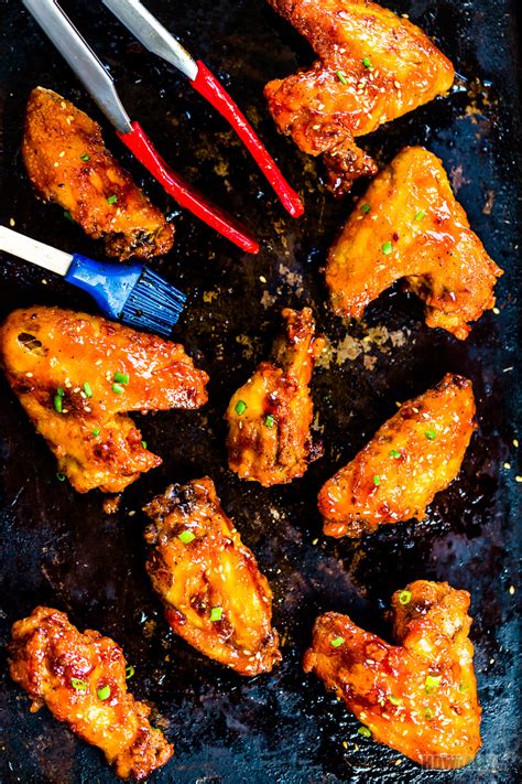 Brush lightly with some of the barbecue sauce. Crispy Oven-baked BBQ Chicken Wings Recipe (Sweet & Spicy)