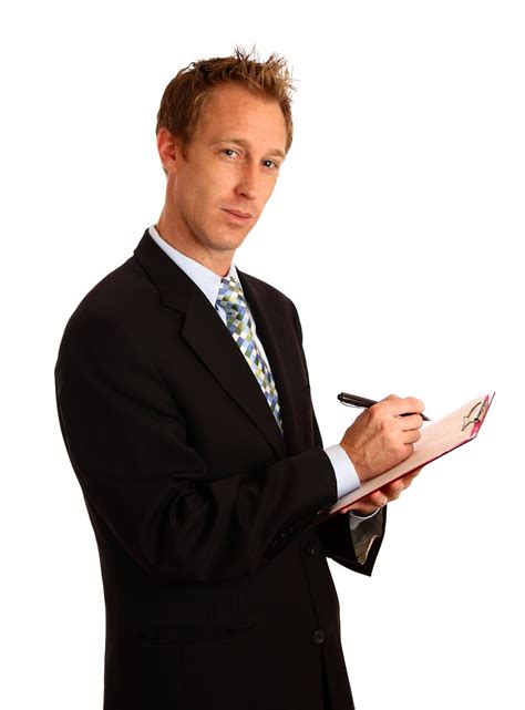 Clipboard Free Stock Photo A Young Businessman Holding A Clipboard