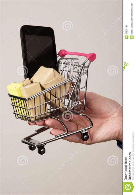Miniature Shopping Trolley Parcels And Mobile Phone Stock Photo Image