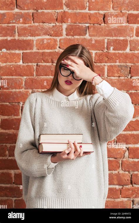 Stress Girl With Books Forgot Something Important Stock Photo Alamy
