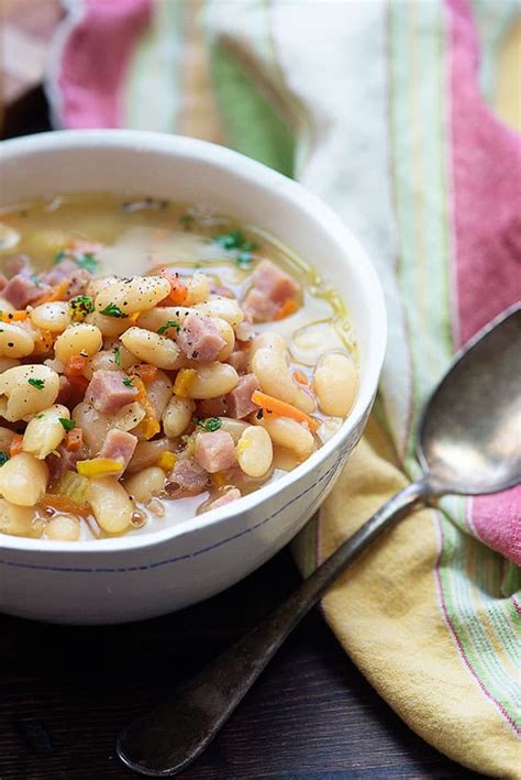 In a large soup pot, melt the butter. white bean and ham soup in bowl | Ham and bean soup, White ...