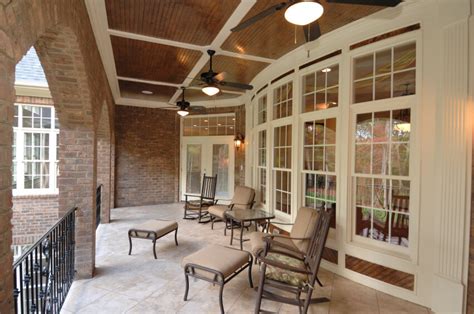 Porch between double bay windows on 1930s house. 55 Luxurious Covered Patio Ideas (Pictures)