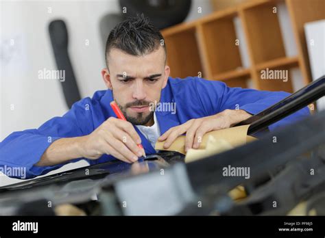 Mechanic Fixing A Car Engine Stock Photo Alamy