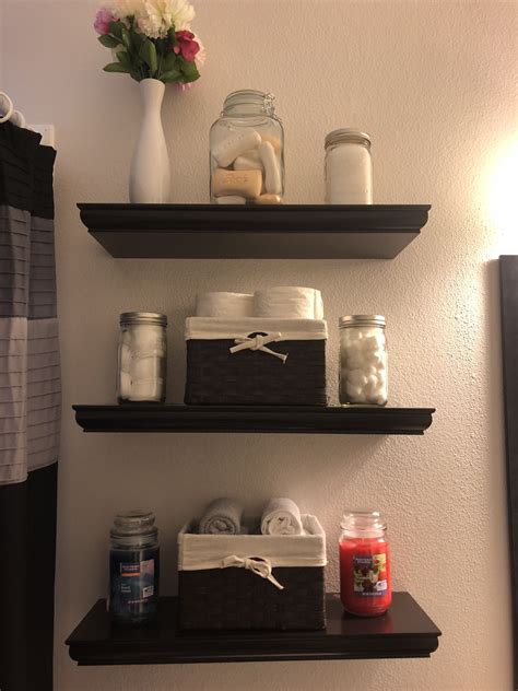 Black Floating Bathroom Shelves With Candles Soap Mason Jars And