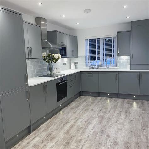 Howdens Kitchen Otley Grey With White Worktop And Built In Appliances