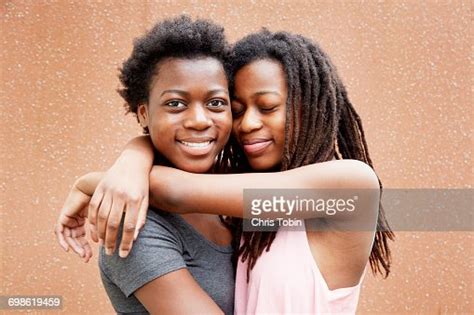 Teenage Girls Hugging Each Other Photo Getty Images