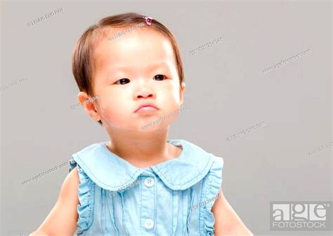 Baby Pouting Stock Photo Picture And Low Budget Royalty Free Image