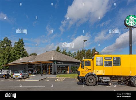 A roadside branch of Starbucks coffee shops in Northamptonshire Stock