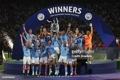 Players Of Manchester City Lift The Uefa Champions League Trophy