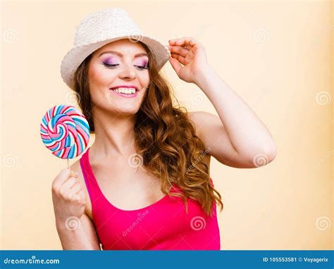 Woman Holds Colorful Lollipop Candy In Hand Stock Image Image Of Shirt Gorgeous 105553581