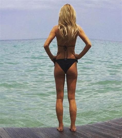 Amanda Holden Quickly Deletes Teasing Bikini Snap After Fans Claim Its