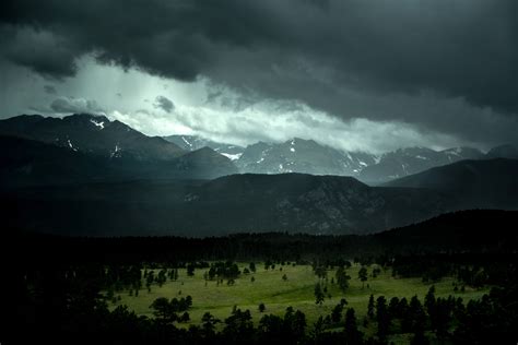 Mountain And Forest Landscape In Colorado Under Stormy Skies Image