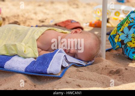 Baby Sleeping On The Beach Summer Holiday Lesbos Island Greece Stock Photo Alamy