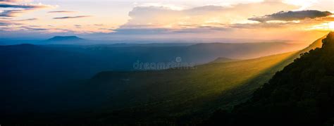 Majestic Sunset In The Mountains Landscape With Sunny Beams Dra Stock