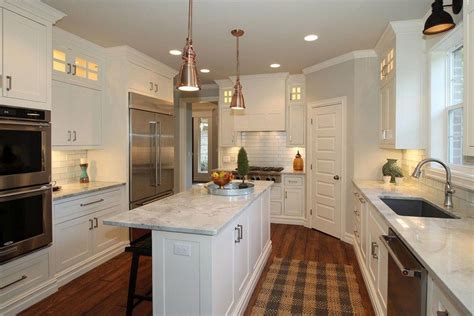 The layout, the doors, the finishes and — gasp — the prices. narrow kitchen island white marble counter cabinet great ...