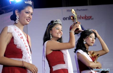 Priyanka Bhandari C Celebrates With Trophy During Miss Global International 2012 Beauty