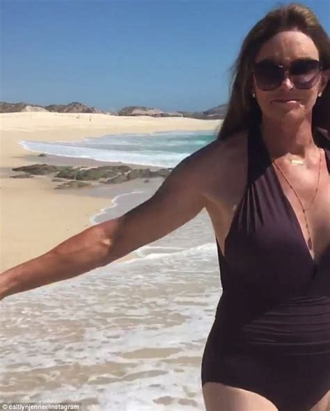 Caitlyn Jenner Parades At The Beach In Plunging Swimsuit Daily Mail