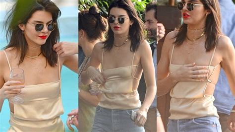 Braless Kendall Jenner Risks Wardrobe Malfunction In Revealing Gold Top
