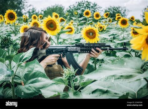 Beautiful And Attractive Woman Soldier With Rifle Machine Gun Female