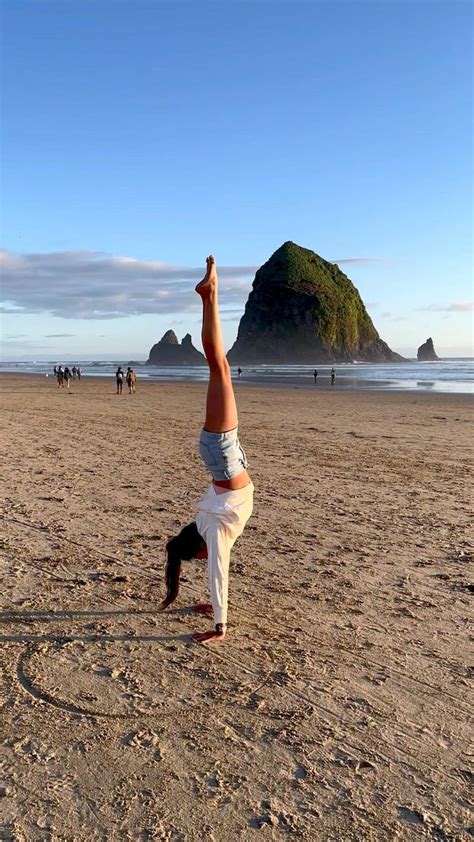 cannon beach oregon in 2022 gymnastics workout ocean sunset photography yoga challenge