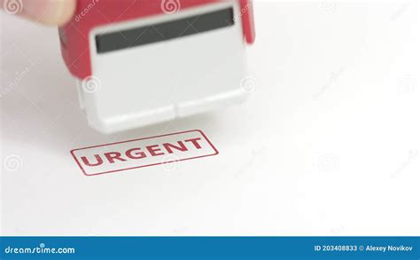 Urgent Red Rubber Stamp On The Paper Stock Image Image Of Document