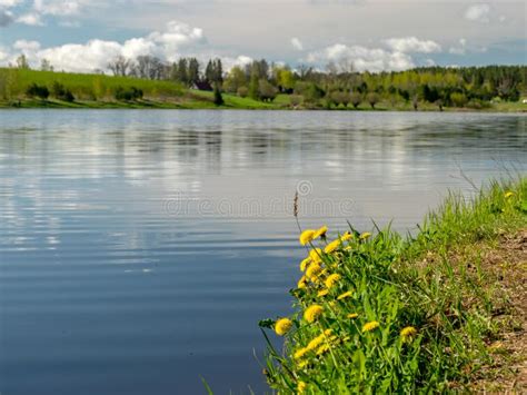 Peaceful Spring Landscape With A Clear Lake And Beautiful Reflections