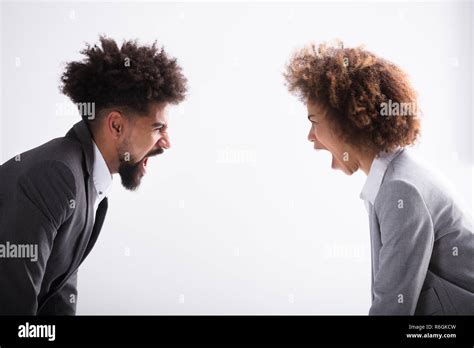 Two Angry Business Partners Shouting At Each Other Stock Photo Alamy