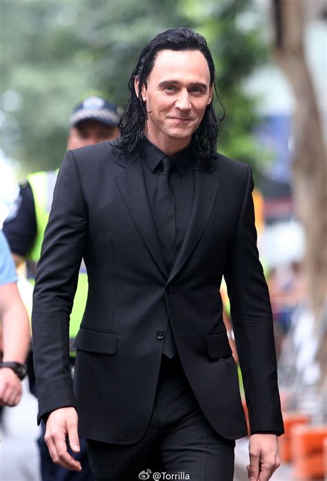 Loki in black suit uploaded by 𝖋𝖊𝖗. on We Heart It