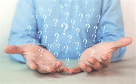 Man Holding Question Marks Business Concept Stock Image Image Of
