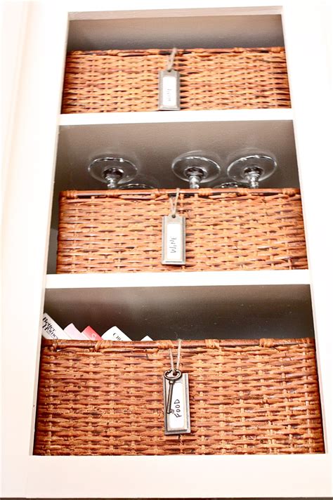 Hang your wine glasses upside down under the cabinetry to keep dust out of the glassware storage racks come in a variety of materials, allowing you to pick a rack that fits your decor. The Yellow Cape Cod: DIY Wine Cabinet~Easiest Wine Storage ...