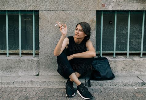 Portrait Of Real Lesbian Woman Smoking On The Street Del Colaborador