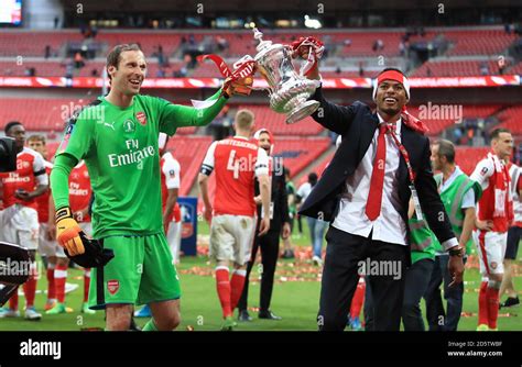 Arsenal Goalkeeper Petr Cech And Jeff Reine Adelaide Celebrate With The