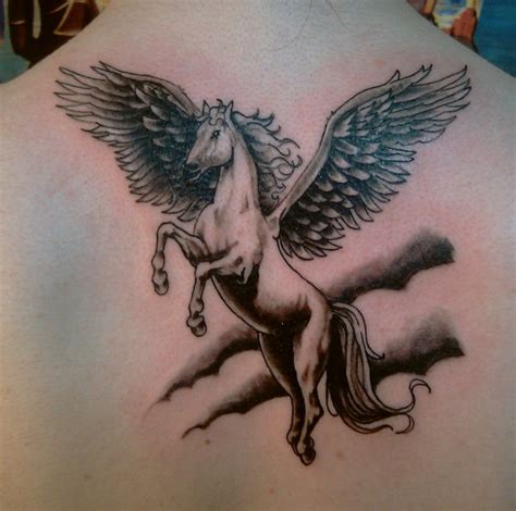 Beautiful Black And White Flying Pegasus Tattoo On Upper Back By Daequitas