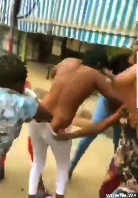 Boobs Out As Nigerian Girl Gets Stripped Naked And Beaten In Public For