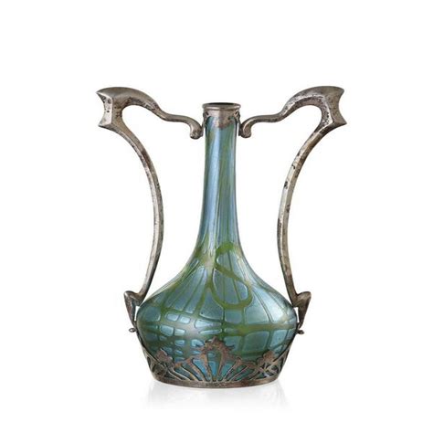 An Art Nouveau Loetz Glass Silver Mounted Vase The Iridescent Blue Bottle Vase With Mesh