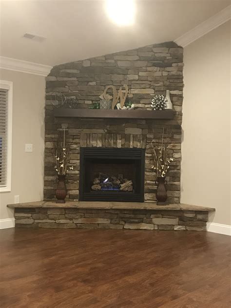 Many modern living room ideas revolve around subdued colors, but not this one. Corner fireplace | Corner brick fireplaces, Corner ...