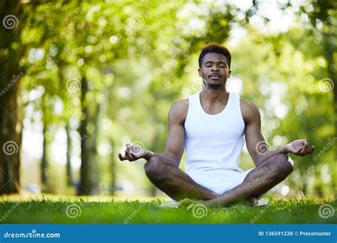 Relaxed Black Man Meditating Alone In Park Stock Photo Image Of Adult