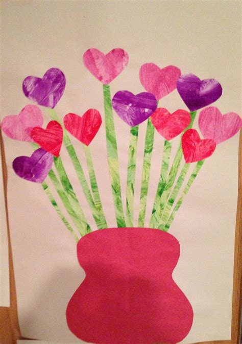 Valentine's Day Flower Craft - child paints a piece of ...