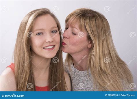 Mature Woman Kissing A Teenage Girl Stock Image Image Of Women Kissing 68383155