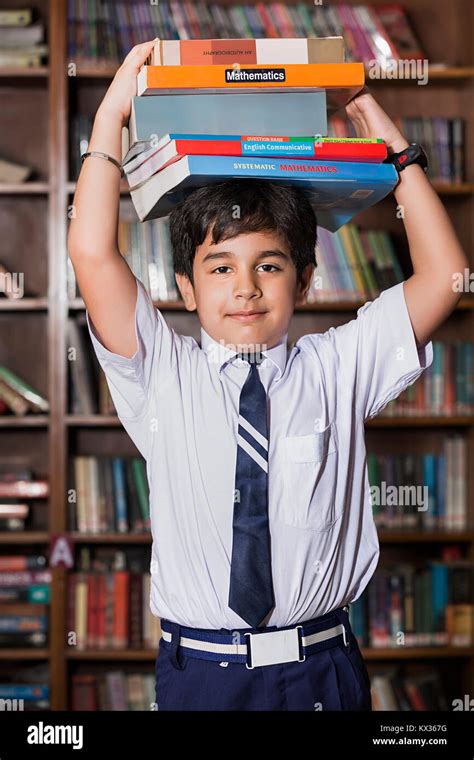 Person Holding Stack Of Books Hi Res Stock Photography And Images Alamy
