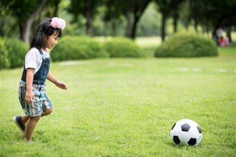 Little Asian Girl Playing Football Park Stock Photos Free And Royalty