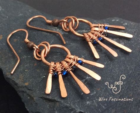 These Handmade Copper Earrings Are Small Circles With Five Flattened
