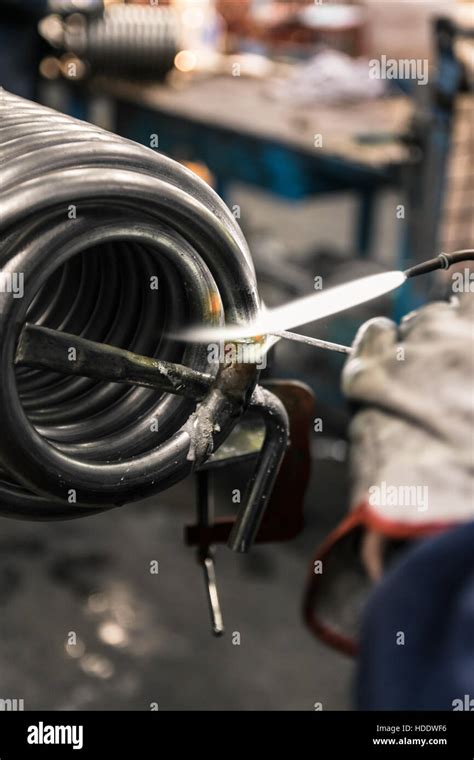 Braze Welding Process In A Metalworking Company Stock Photo Alamy