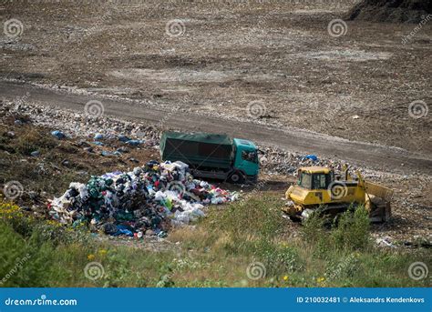 Landfill And Tractor In Desert Stock Photography