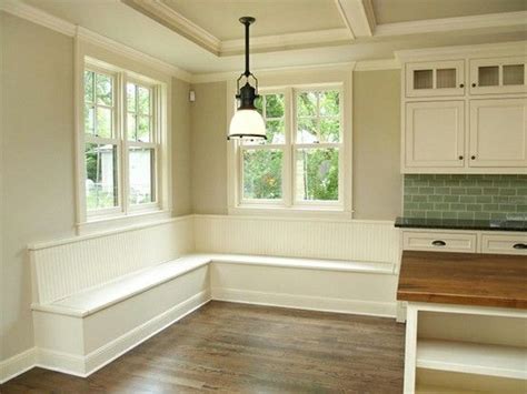 He made the underneath storage space that went all the way through. Breakfast nook bench, green subway tile, green/taupe paint ...