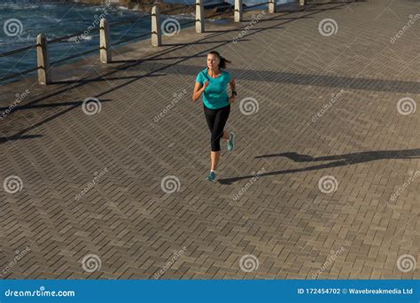 Female Jogger Running On Seaside Stock Photo Image Of Enjoying